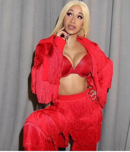 A picture of Cardi B with her $40k smile.